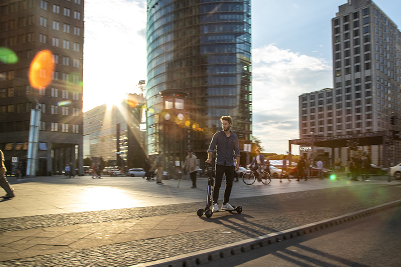Audi combines e-scooter with skateboard