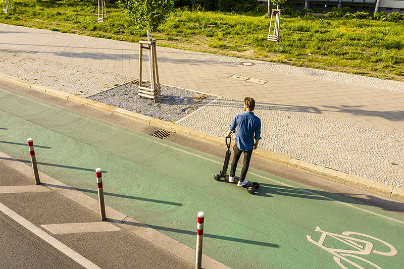 Audi combines e-scooter with skateboard