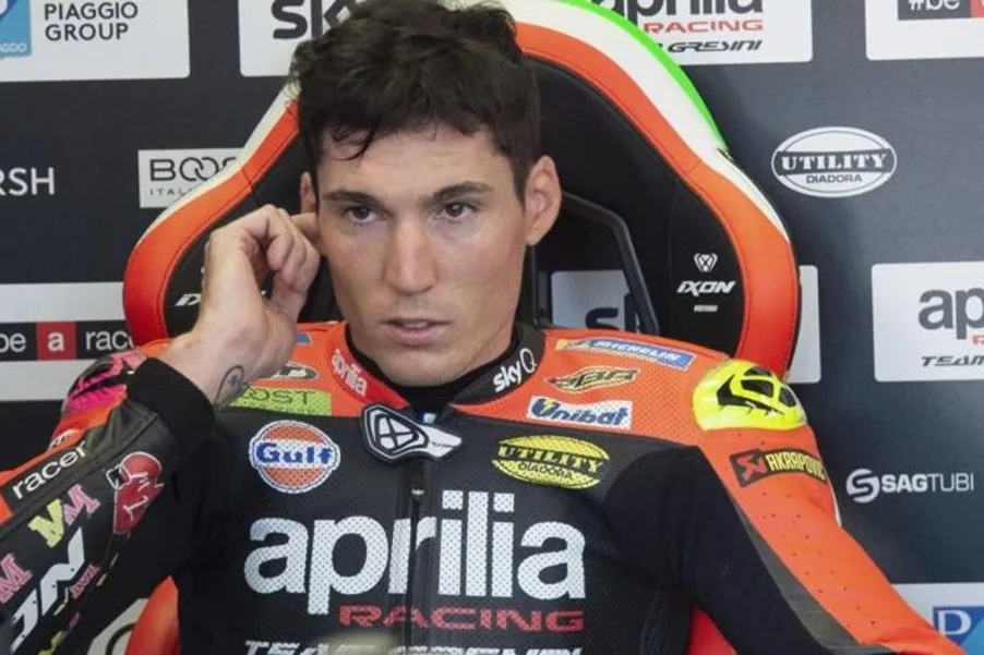 Aleix Espargaro on his MotoGP motorcycle during a racing event.