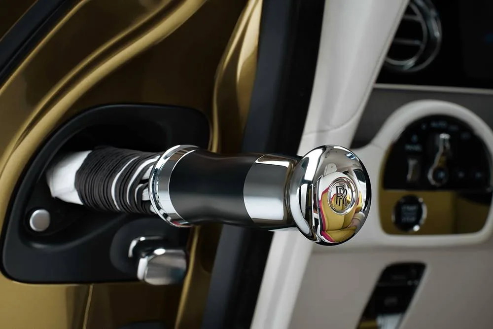 The 2024 Rolls-Royce Spectre electric coupé is presented in this press image