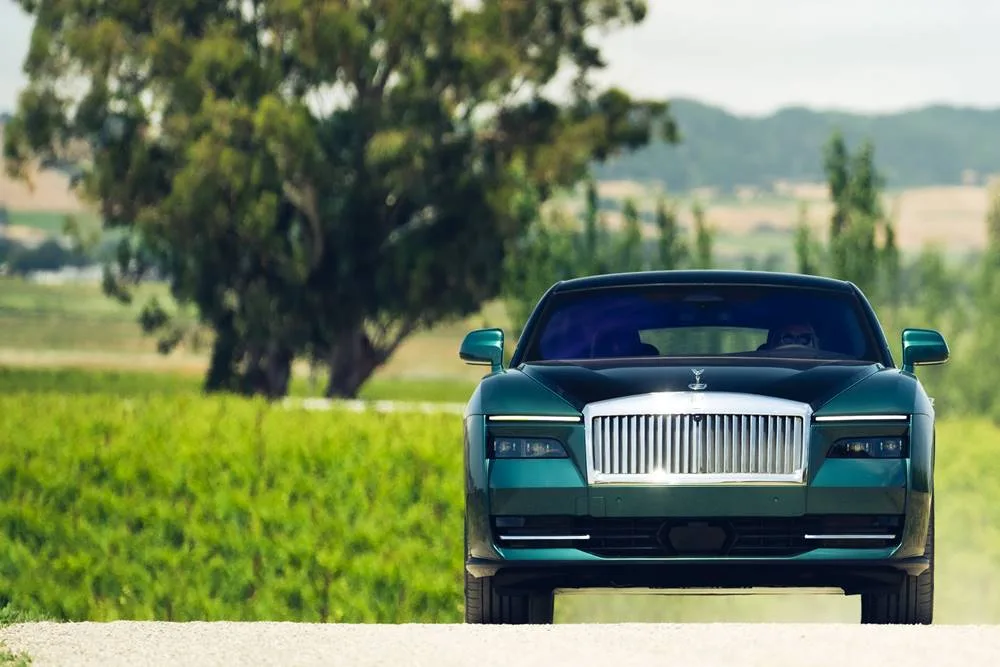 Electric Rolls Royce Spectre, showcasing its sophisticated lines and premium finish.