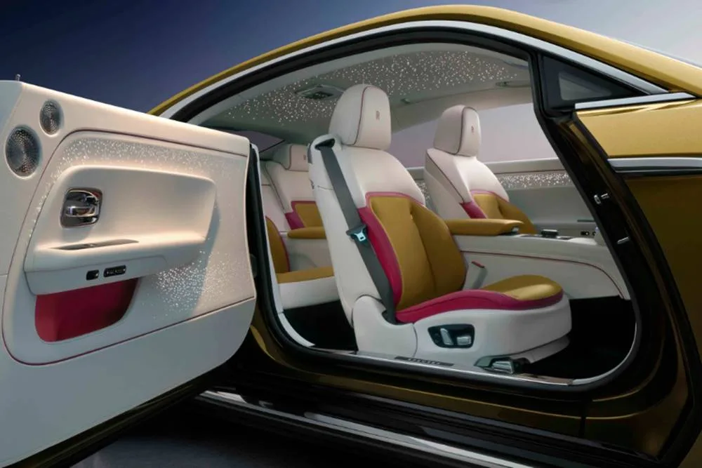 Interior of the electric Rolls Royce Spectre, highlighting its opulent design and premium materials.