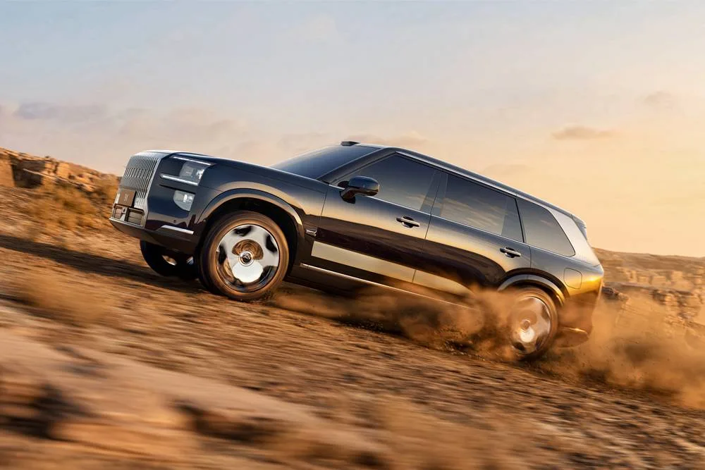 Zeekr X9 crosing dunes 