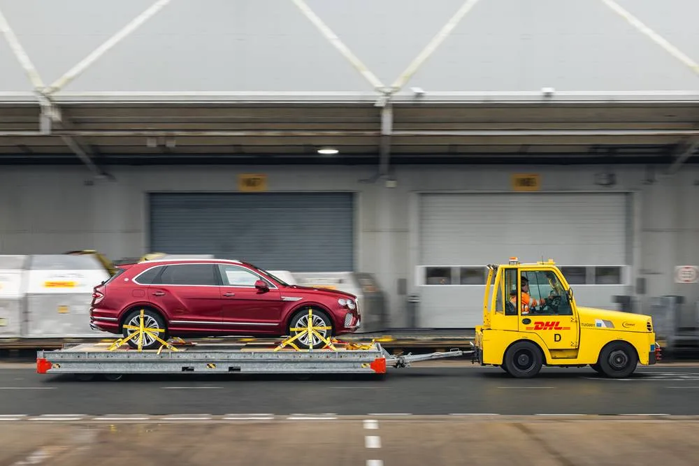 Nothing says environmental stewardship quite like a kerosene-chugging cargo plane acting as a glorified courier for an impatient billionaire's new toy.