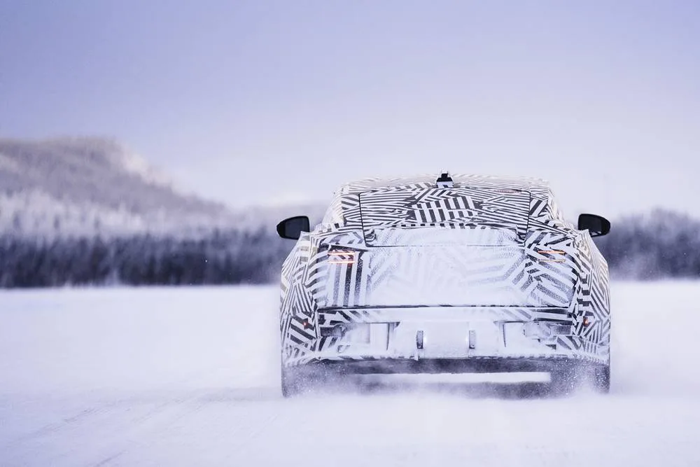 JAGUAR electric GT arctic testing rear kicking up snow