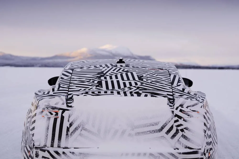 JAGUAR electric GT arctic testing rear kicking up snow