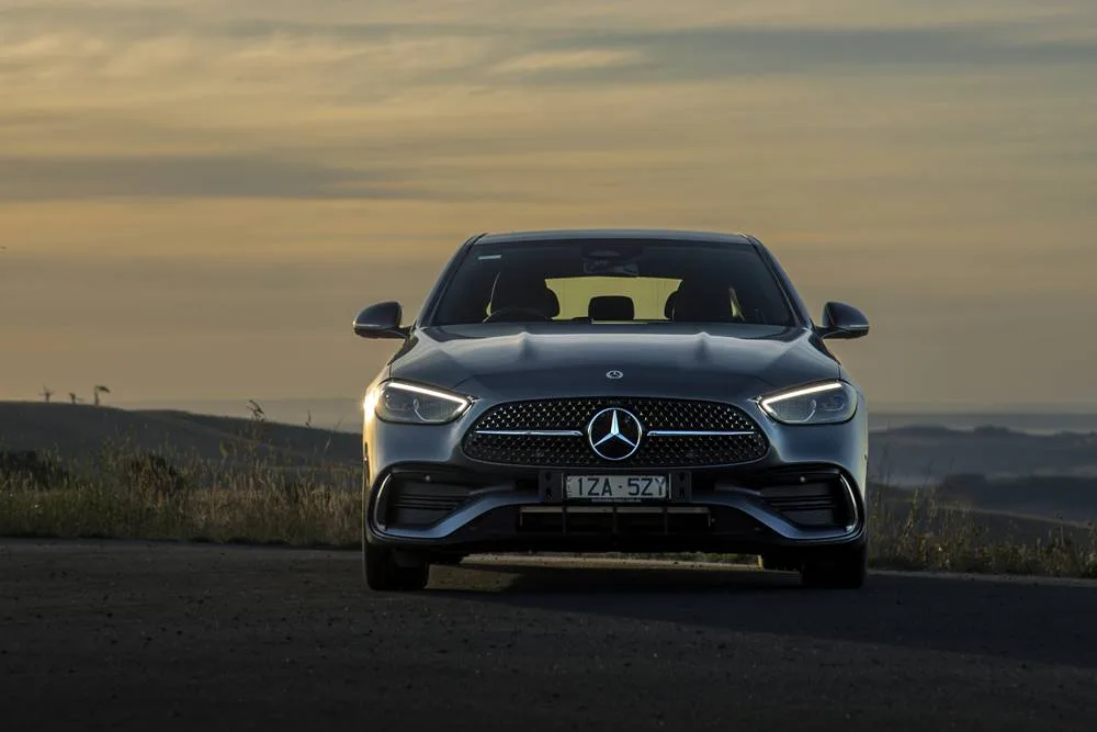 Mercedes Benz C300 AMG front on country side surrounds
