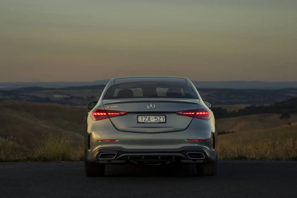 Mercedes Benz C300 AMG rear on country side surrounds