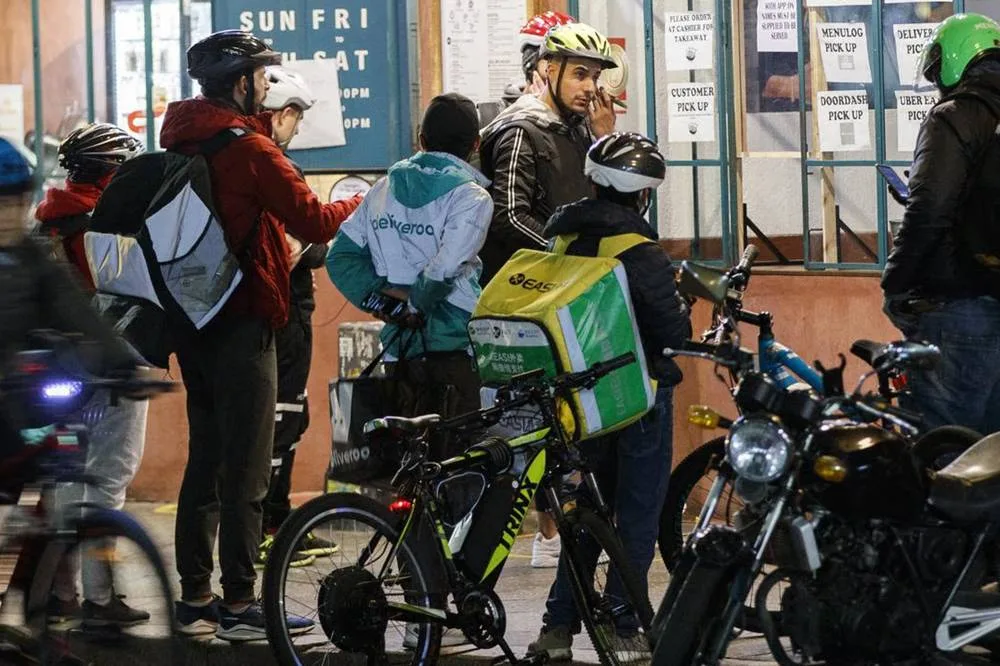 delivery e-bikes cause chaos - bikes take over the footpaths