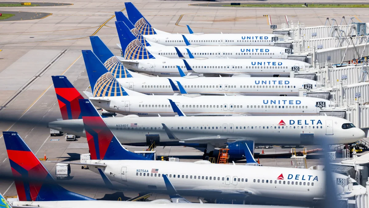 United and Delta aircraft parked at airport terminal