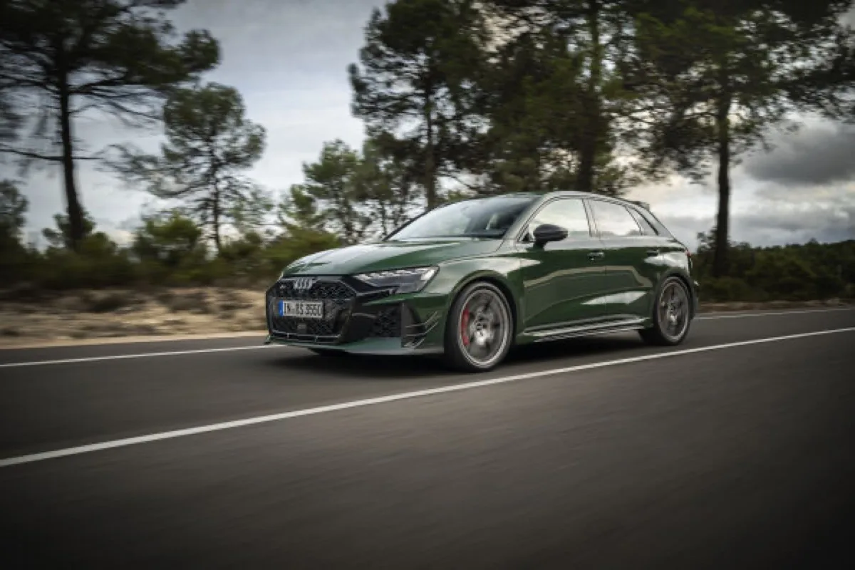 2026 Audi RS 3 competition limited Sportback in Malachite green, rolling front three-quarter view
