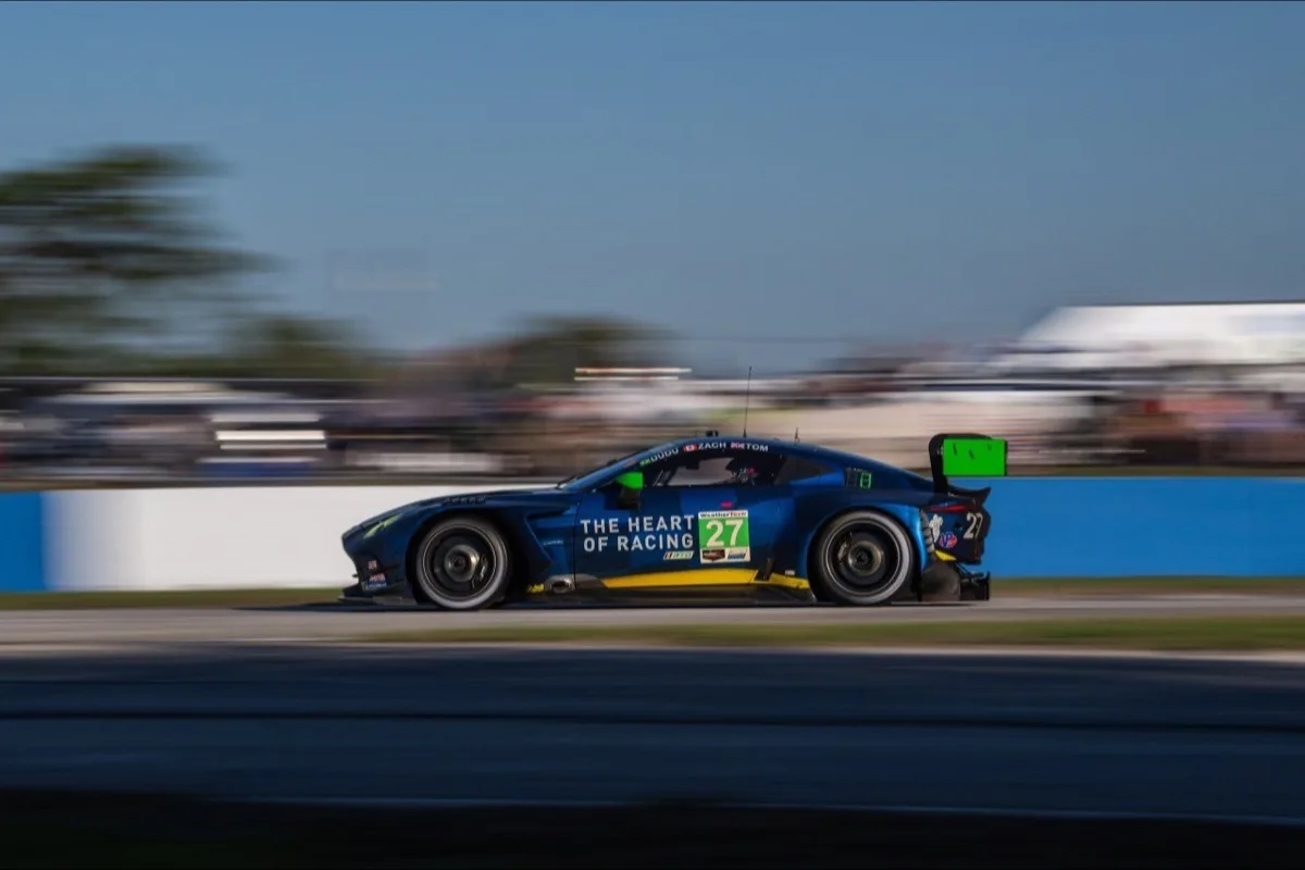 Aston Martin Vantage GT3 passing palm trees at Sebring