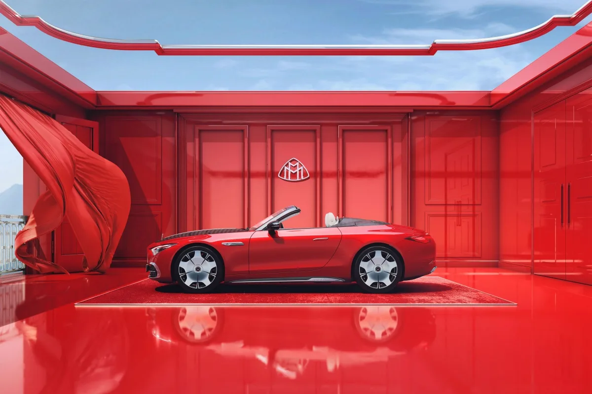 Mercedes-Maybach SL 680 side view in red room with see through roof in room