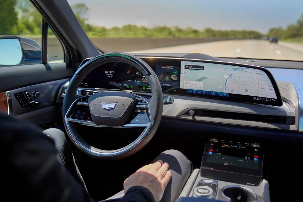 Driver view of the interior of the 2026 Cadillac VISTIQ with Super Cruise hands-free driver assistance technology engaged.
