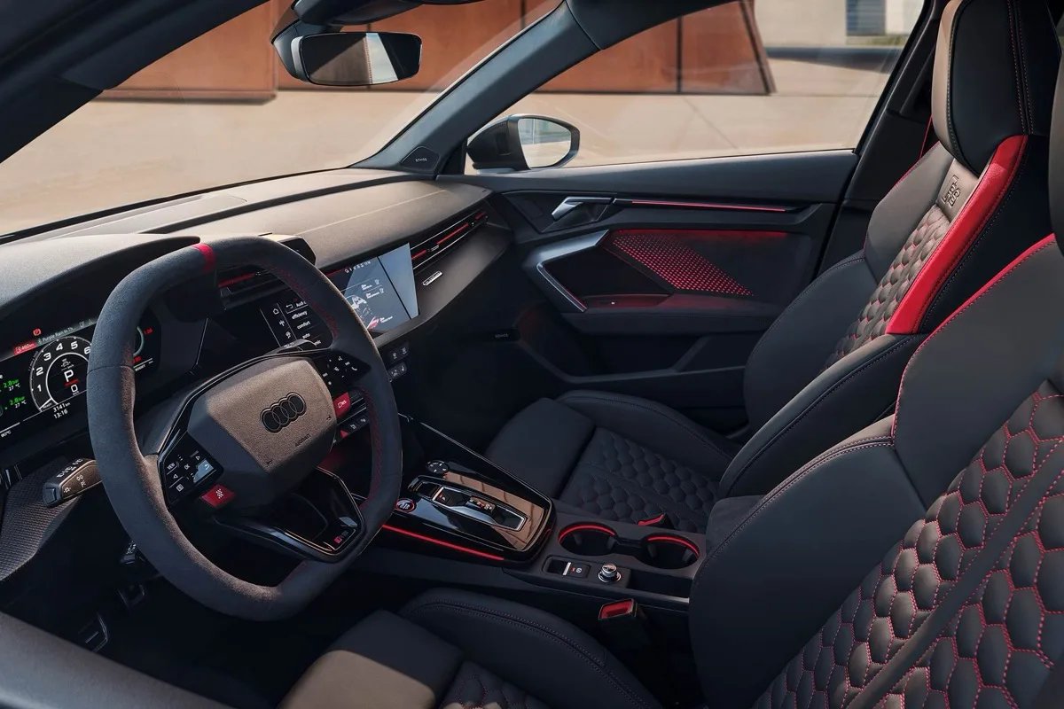 2026 Audi RS 3 Competition Limited interior dashboard with carbon atlas inlays and ambient lighting