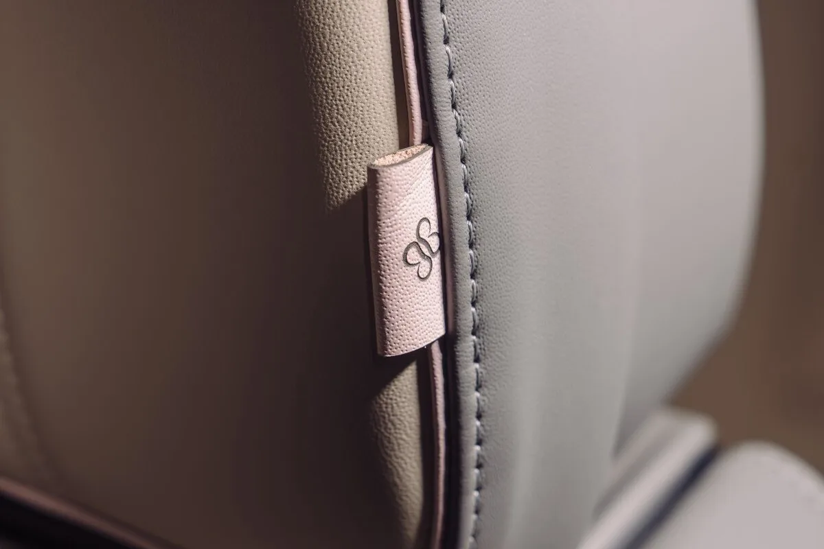 Boodles leather tag stitched into Bentley seat with Be Boodles branding