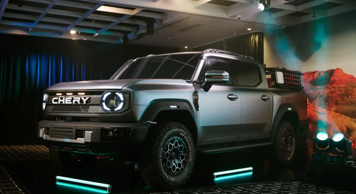 Chery plug-in hybrid diesel ute front three-quarter view in matte silver at Australian reveal event