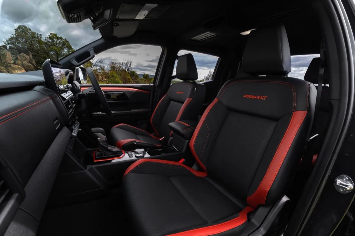 2026 Nissan Navara PRO-4X front seats with black leather and red accents