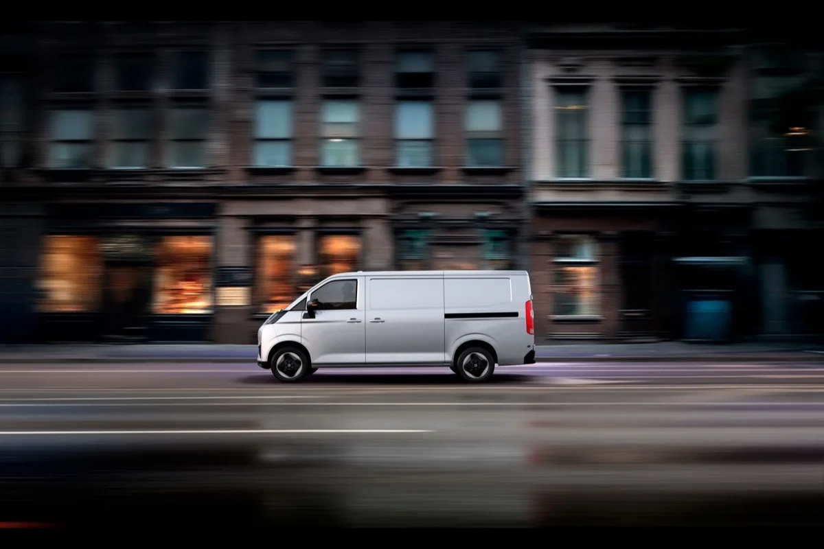 2026 Farizon V7E electric van side profile in white motion shot