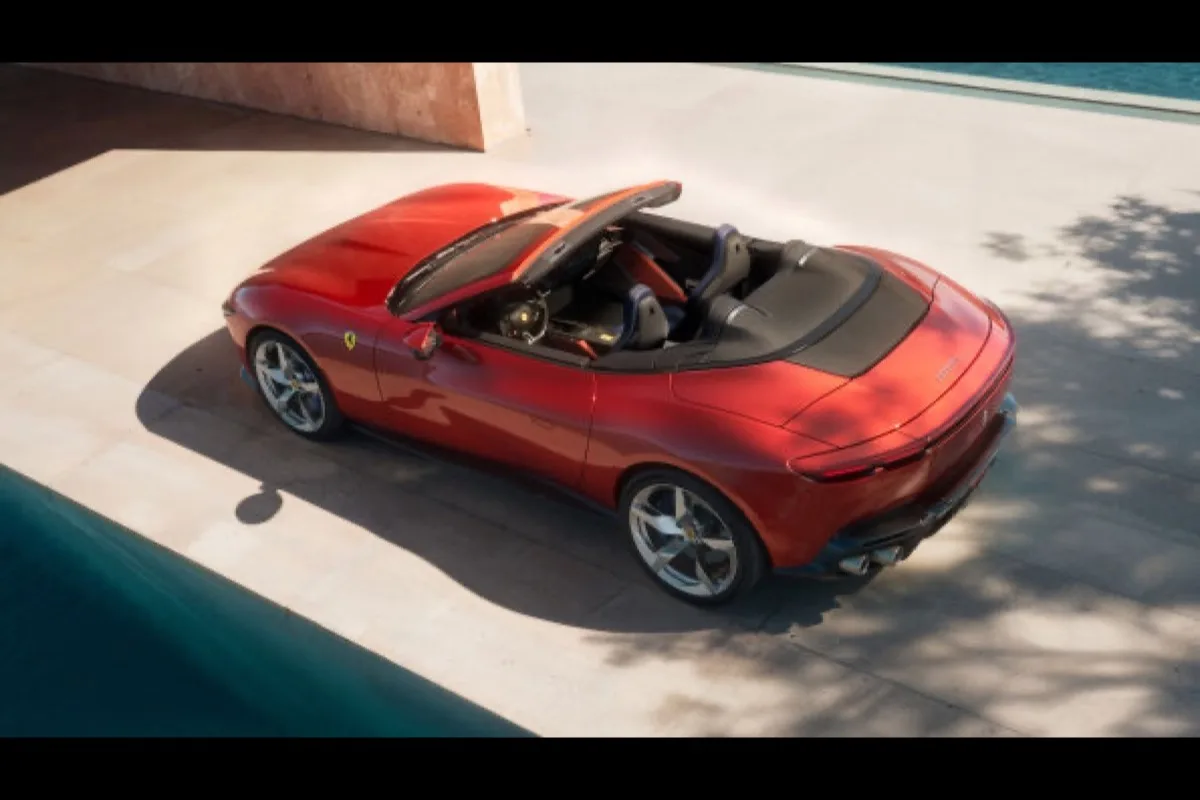 2026 Ferrari Amalfi Spider rear three-quarter view from above in Rosso Tramonto