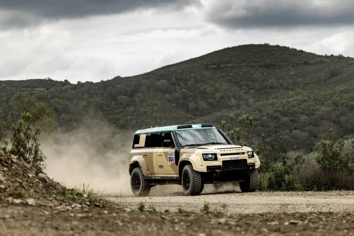 Defender Dakar D7X-R racing through dusty Portuguese terrain