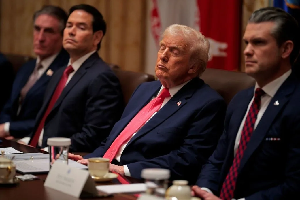 President Trump at Cabinet meeting with eyes closed, Secretary Rubio nearby