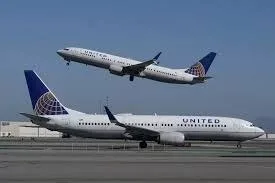 Two United Airlines 737 aircraft at terminal