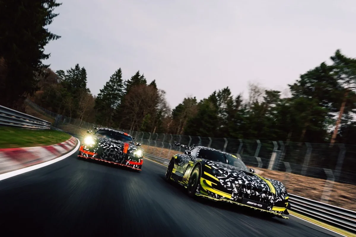 Mercedes-AMG GT Black Series and GT3 prototypes on track at dusk