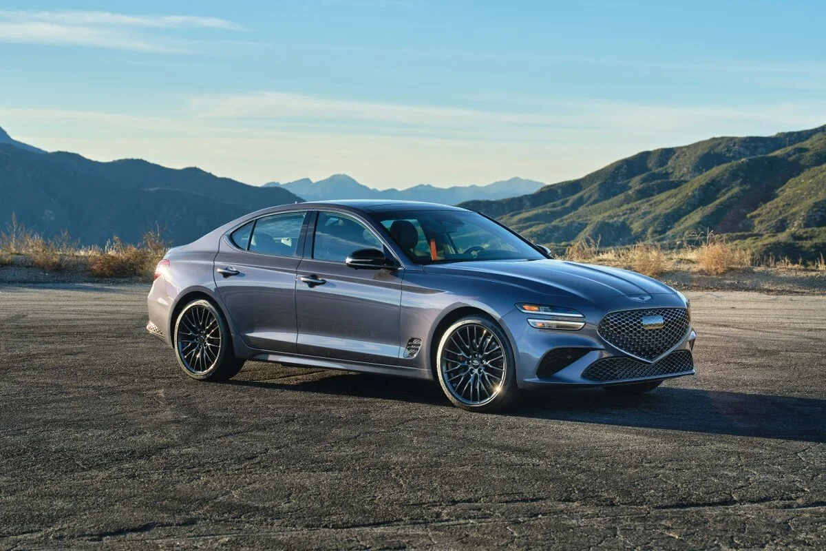 2026 Genesis G70 Prestige Graphite in Ceres Blue with California mountains behind