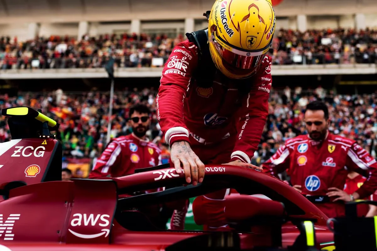 Lewis Hamilton on the podium after his first Ferrari podium at the Chinese GP