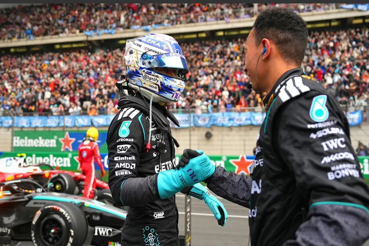 Kimi Antonelli and George Russell fist bump after Mercedes 1-2