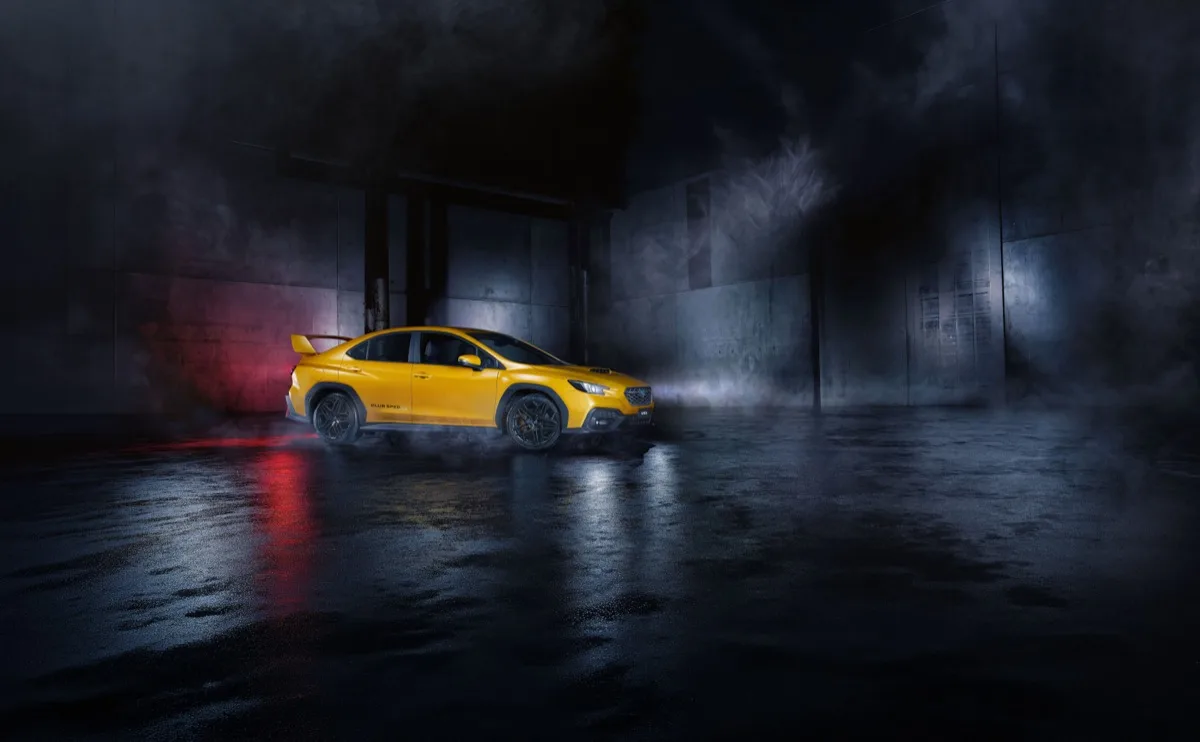 2026 Subaru WRX Club Spec Evo side profile in Sunrise Yellow with Club Spec badge and rear spoiler