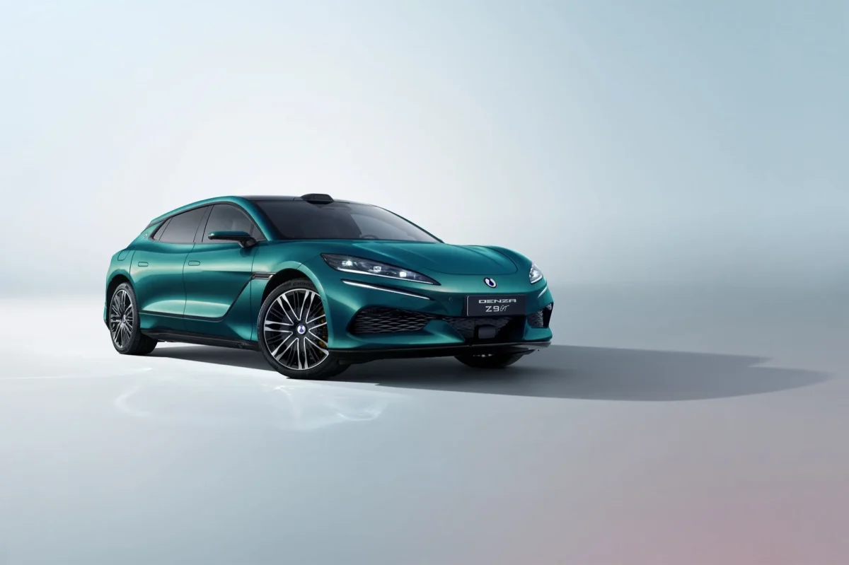 DENZA Z9GT electric shooting brake front three-quarter view in teal green metallic in studio setting