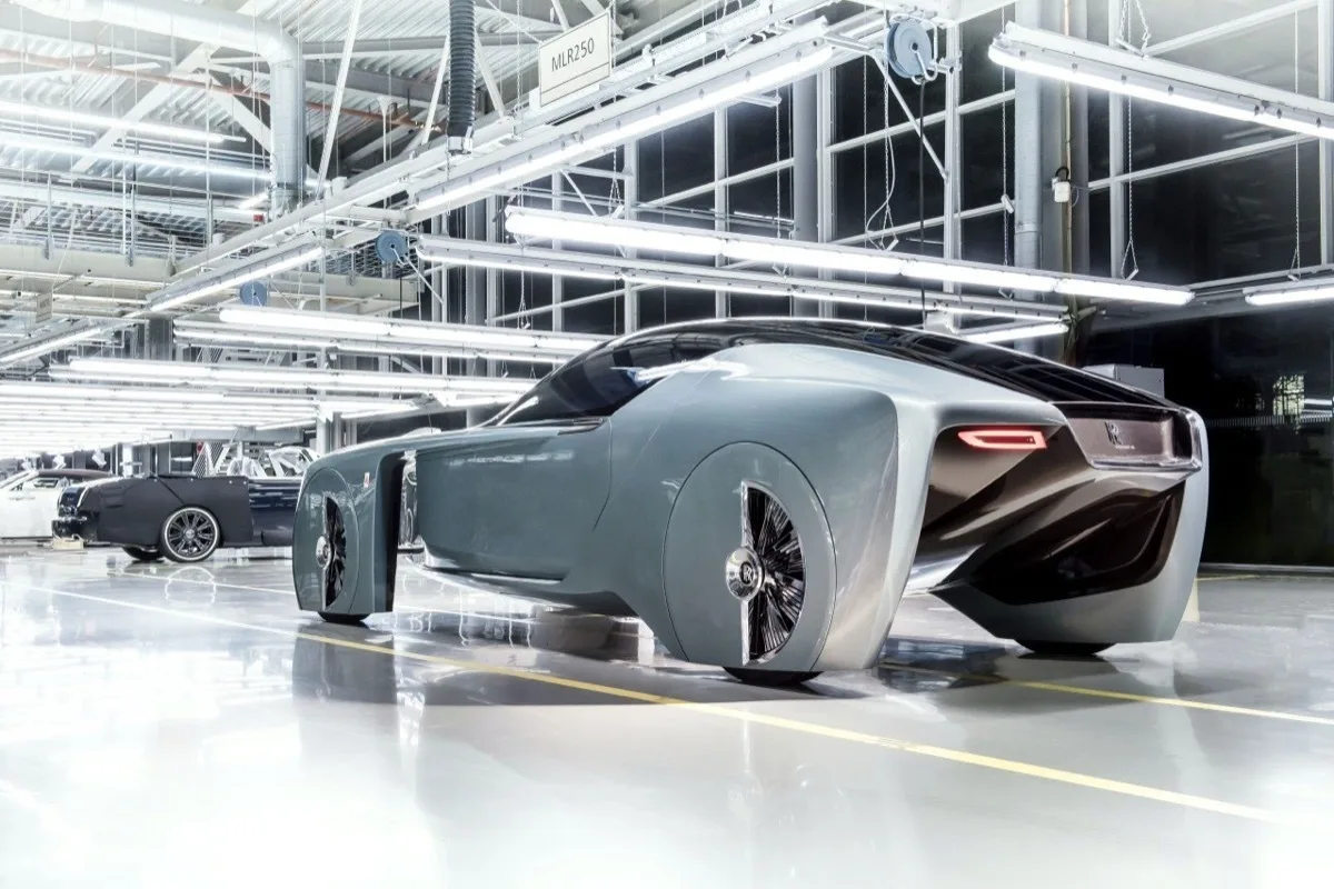 2026 Rolls-Royce 103EX rear three-quarter view inside Goodwood factory