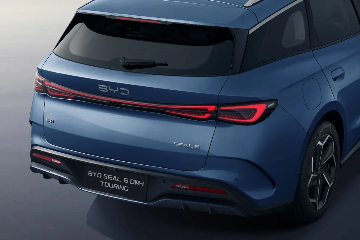 2026 BYD Seal 6 Touring rear detail in blue showing taillights and tailgate