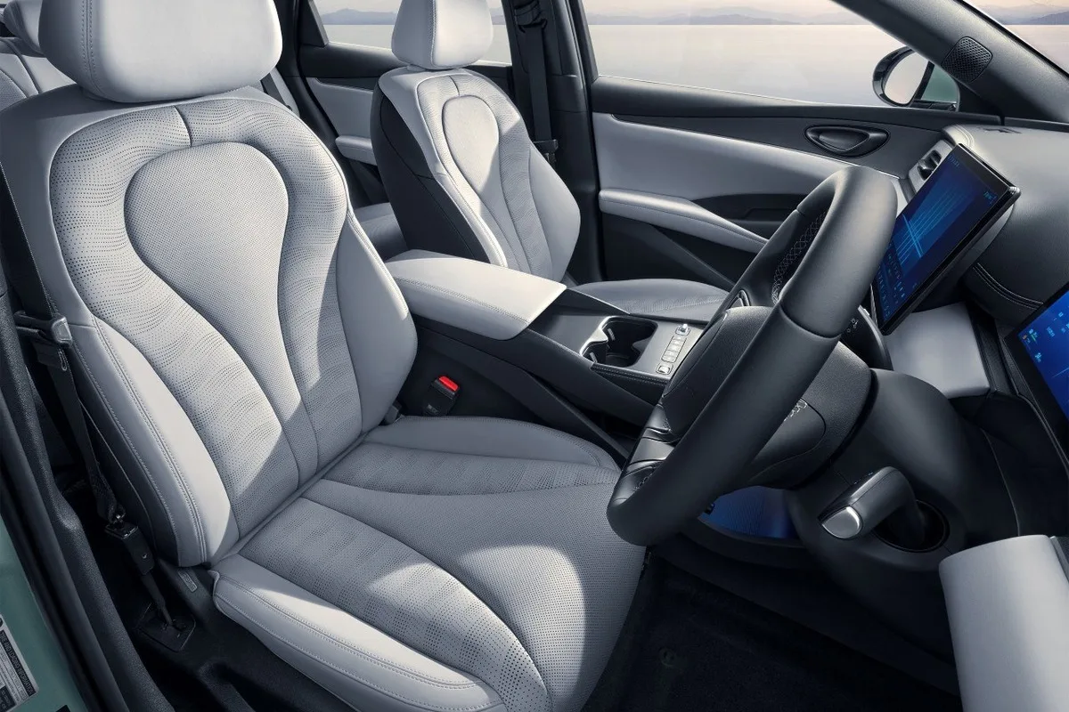 2026 BYD Seal 6 interior with pale front seats and large central touchscreen