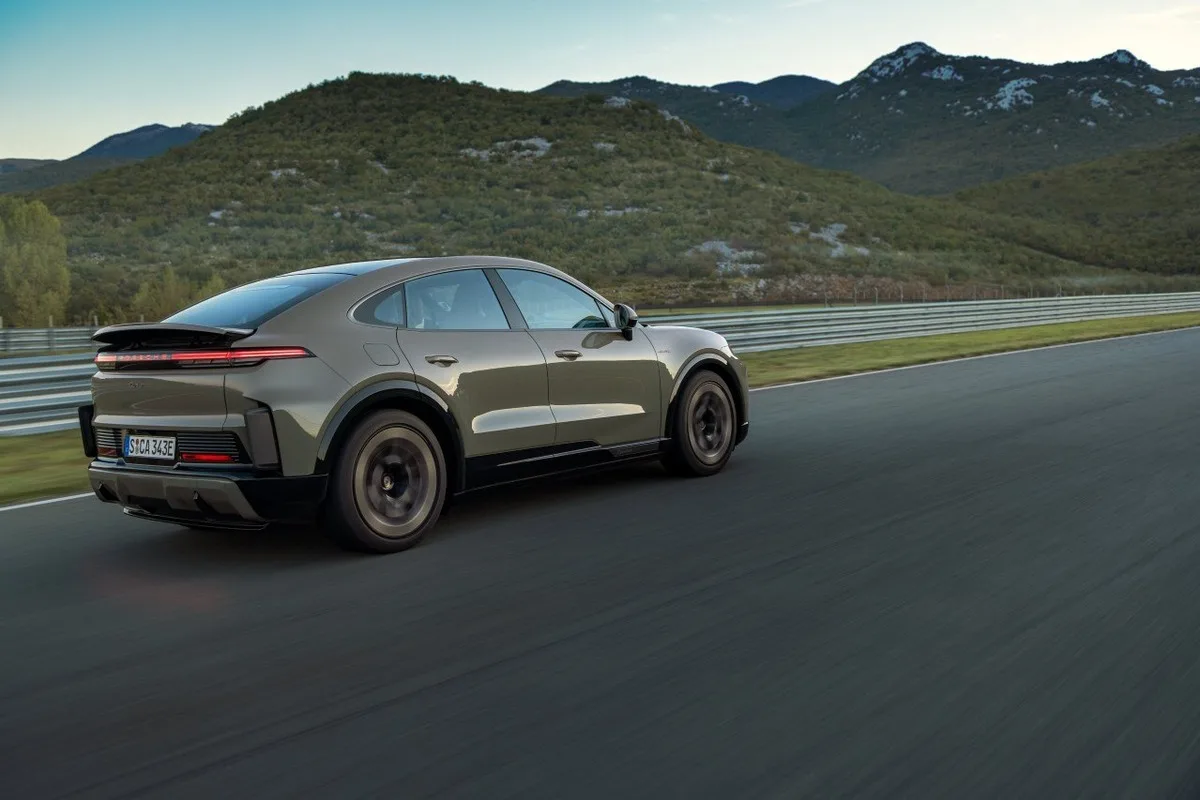 2026 Porsche Cayenne Coupe Electric side rear rolling view on the road