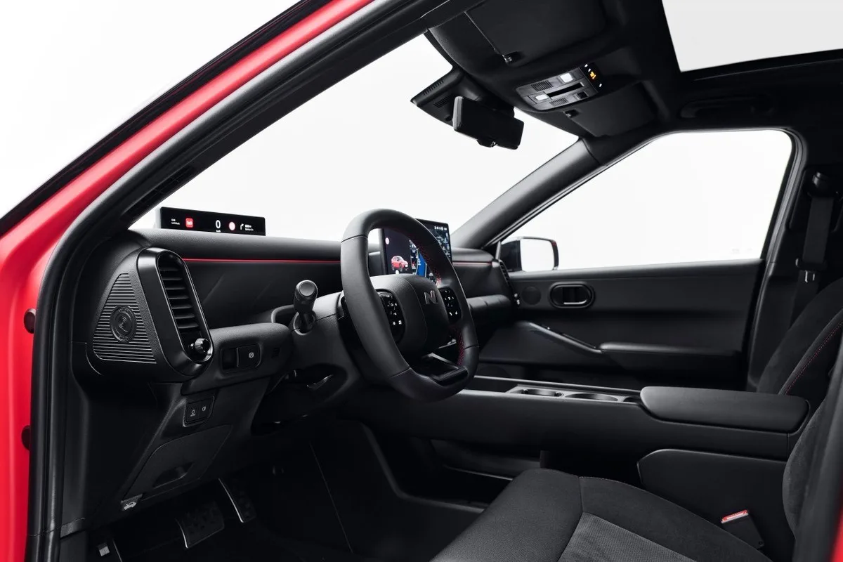 2027 Hyundai IONIQ 3 interior showing the driver side cabin and front seats