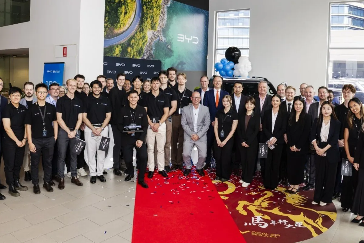 BYD Australia staff and guests at 100,000th delivery celebration group photo