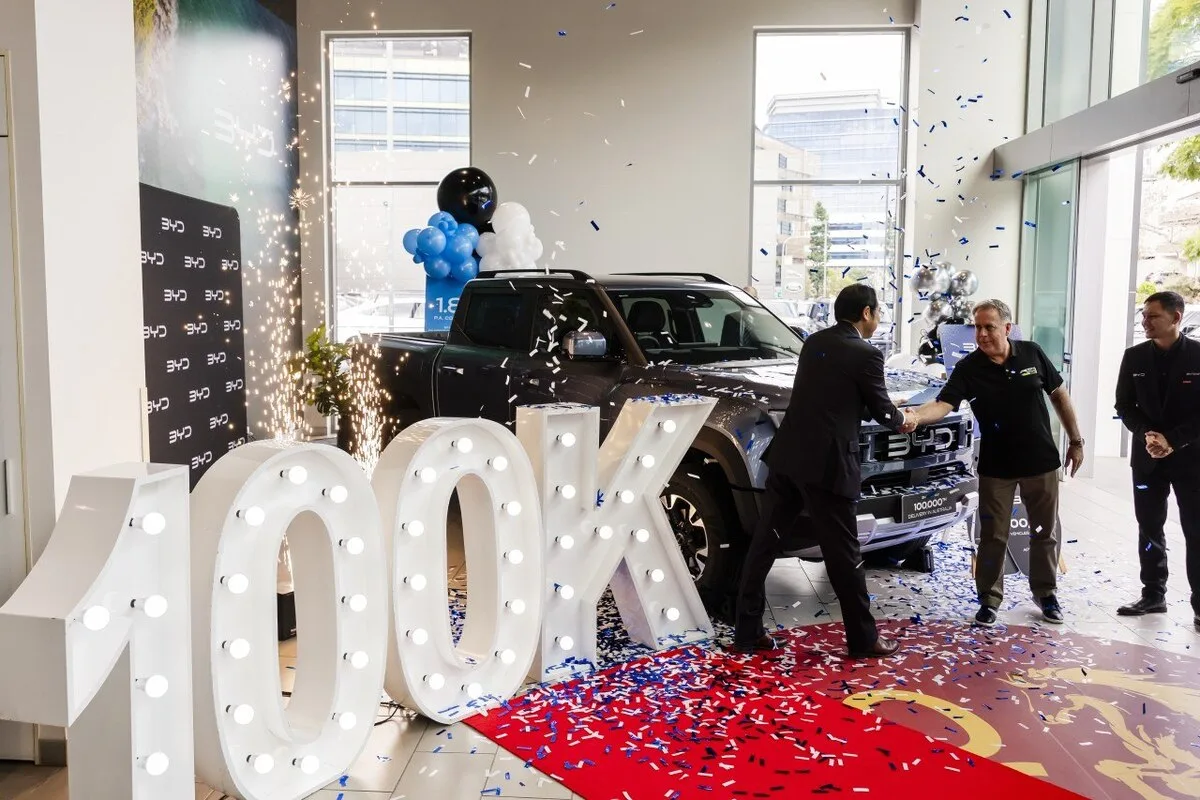 2026 BYD Shark 6 handover at BYD Australia 100,000th delivery milestone in showroom
