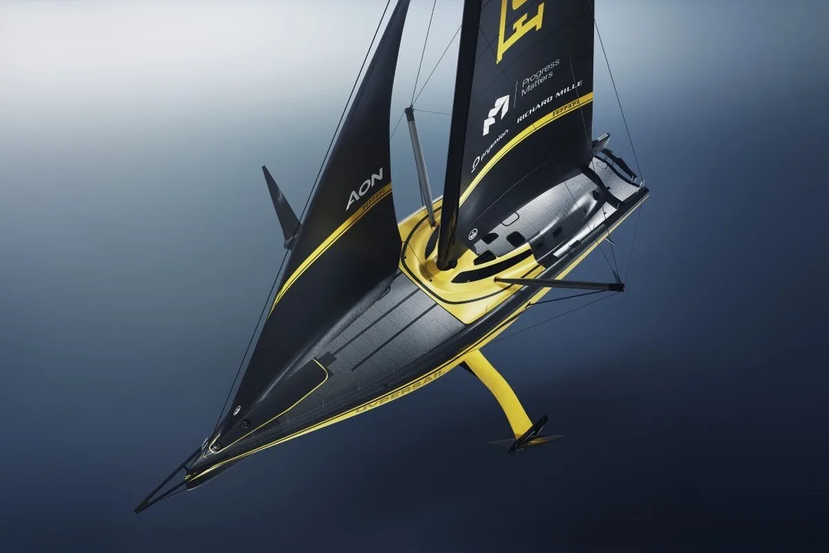 Top-down render of the Ferrari Hypersail foiling yacht in black and yellow livery with twin sails and visible Ferrari branding