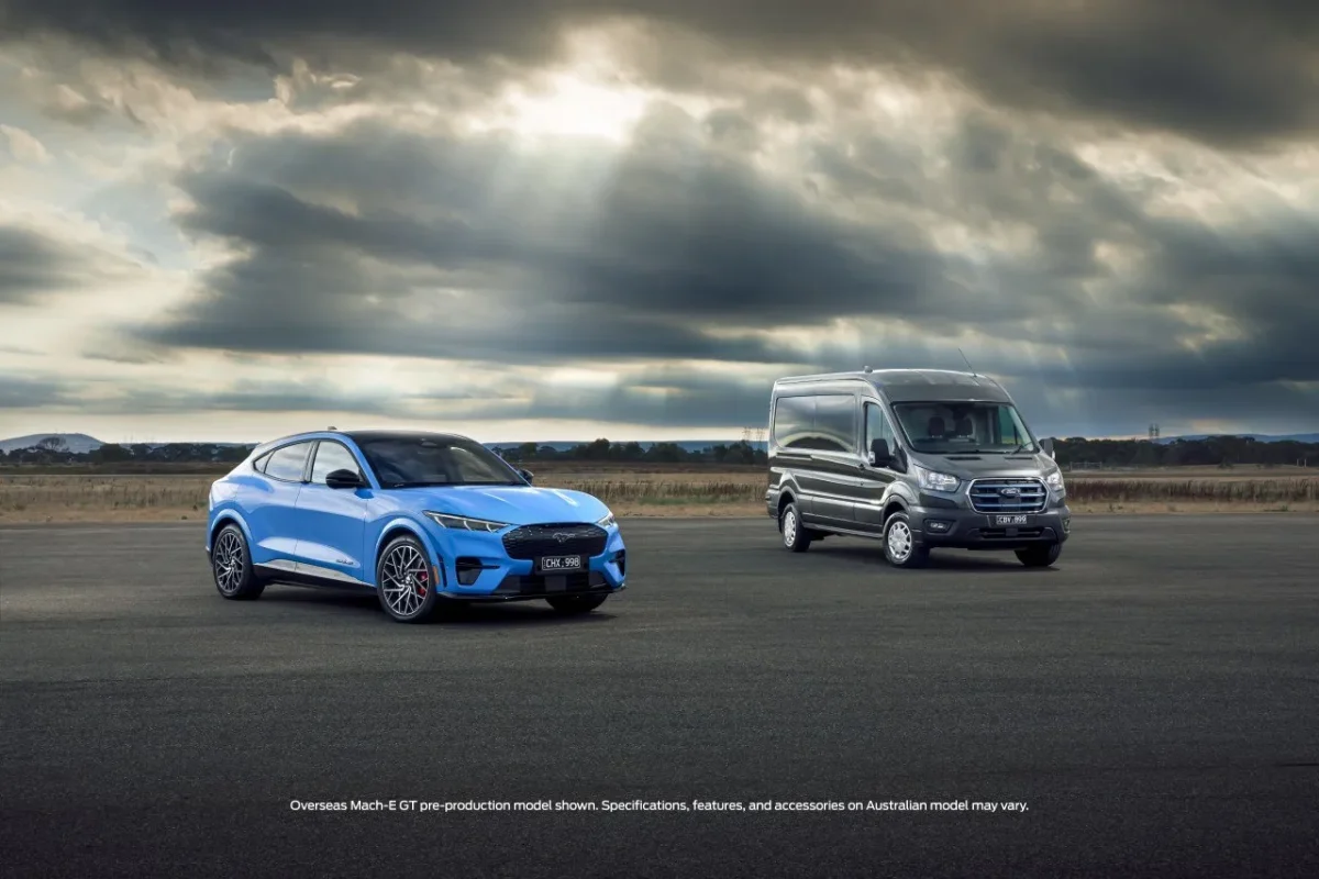 Ford Mustang Mach-E GT in red alongside white E-Transit van