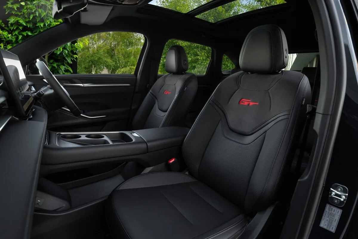 Black GWM GT front seats with red GT embroidery, center console and panoramic sunroof