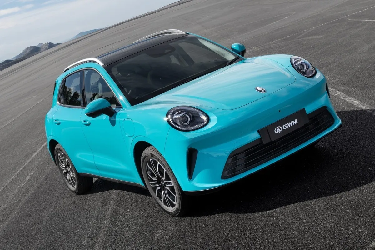 2026 GWM ORA 5 in turquoise shown from a high front three quarter angle on a paved test road