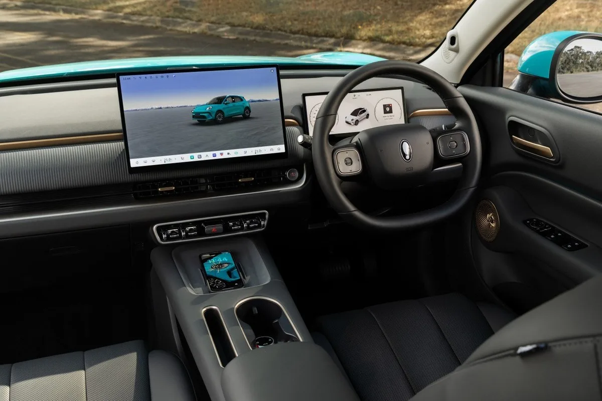 2026 GWM ORA 5 right hand drive dashboard with digital instruments, Coffee OS touchscreen, and bronze trim accents