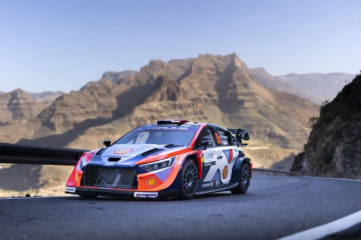 Hyundai i20 N Rally1 car cornering on a dry mountain road ahead of Rally Islas Canarias