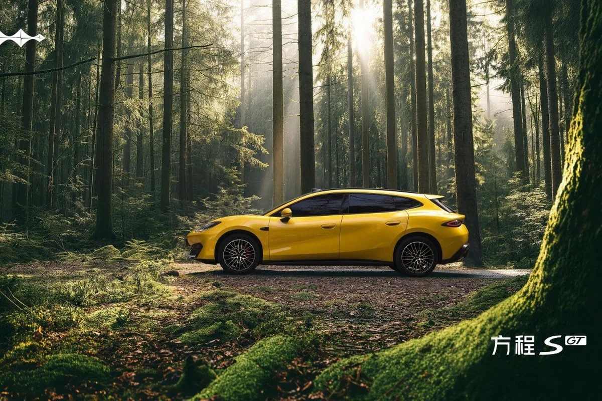 Fangchengbao FORMULA S GT yellow shooting brake parked in a sunlit forest