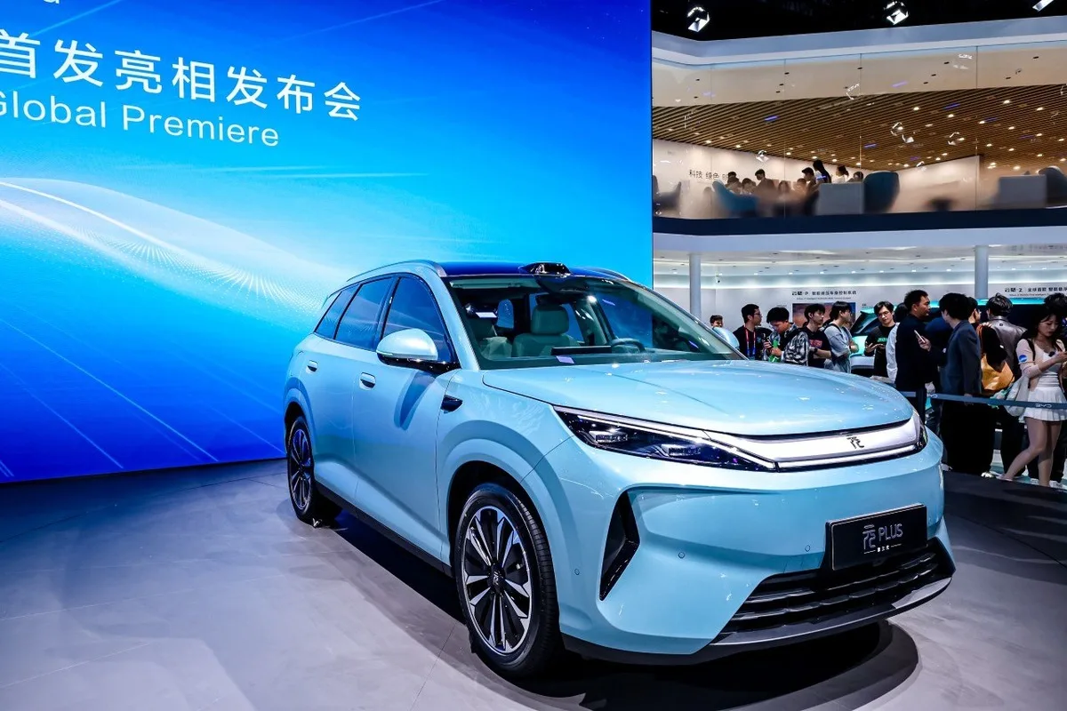 BYD Yuan Plus light blue SUV on a Beijing Auto Show premiere stand