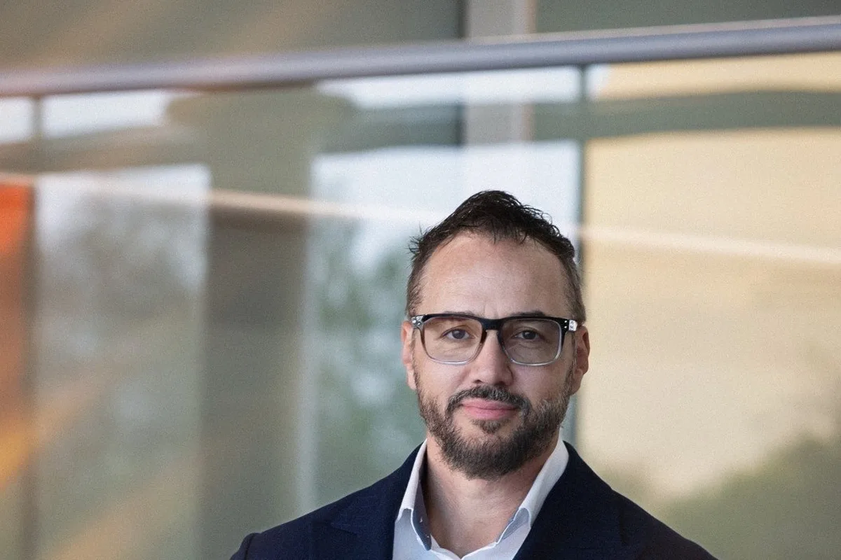 Kemal Curic corporate portrait against glass background