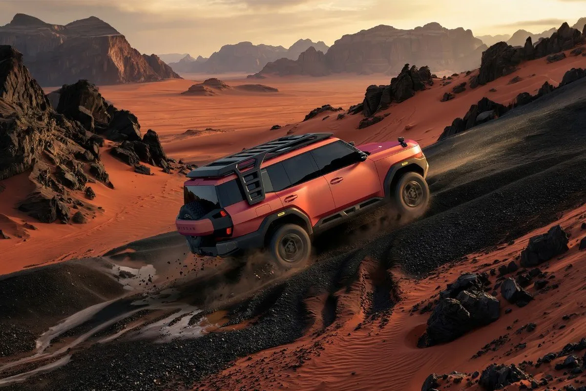 Nissan Terrano PHEV Concept climbing a steep rocky desert slope in rear three-quarter view